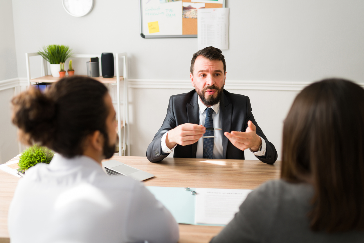 Victim Advocate Working With Clients in an Office.