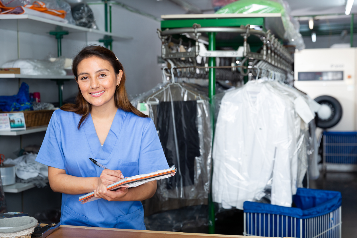 Nurse With a Clipboard Taking Stock of Resources in a Medical Facility.