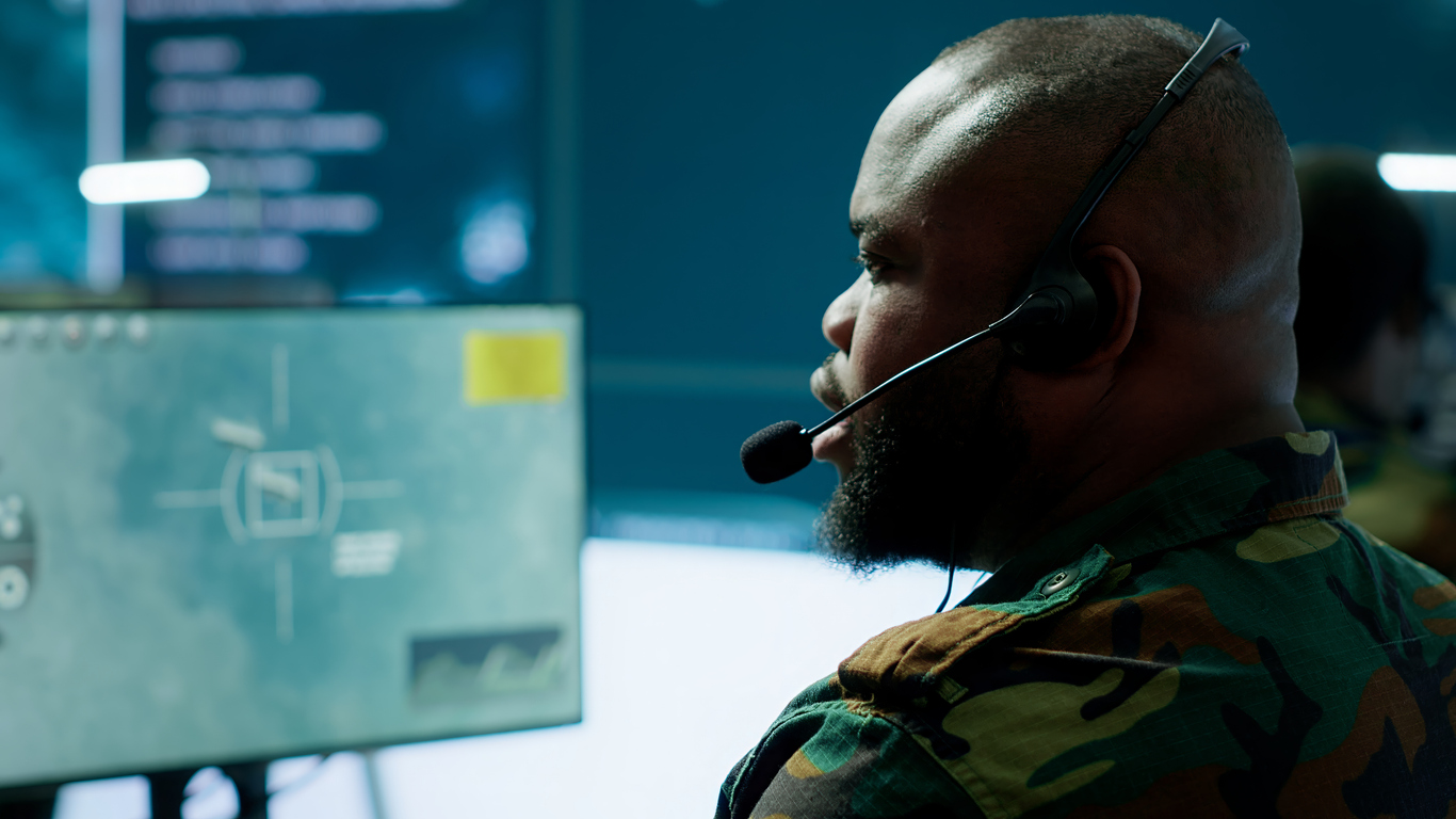 Intelligence Professional in an Army Uniform Wearing a Headset.