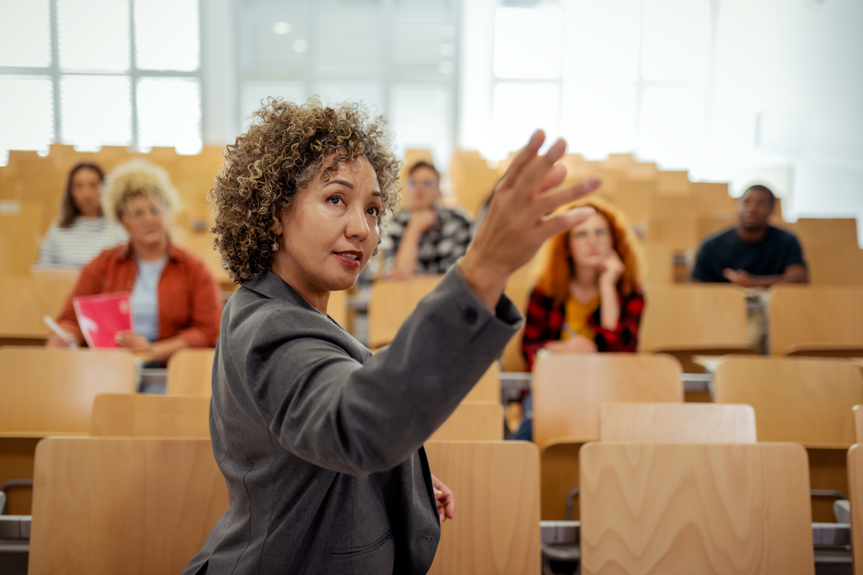 An assistant professor leads a lecture.