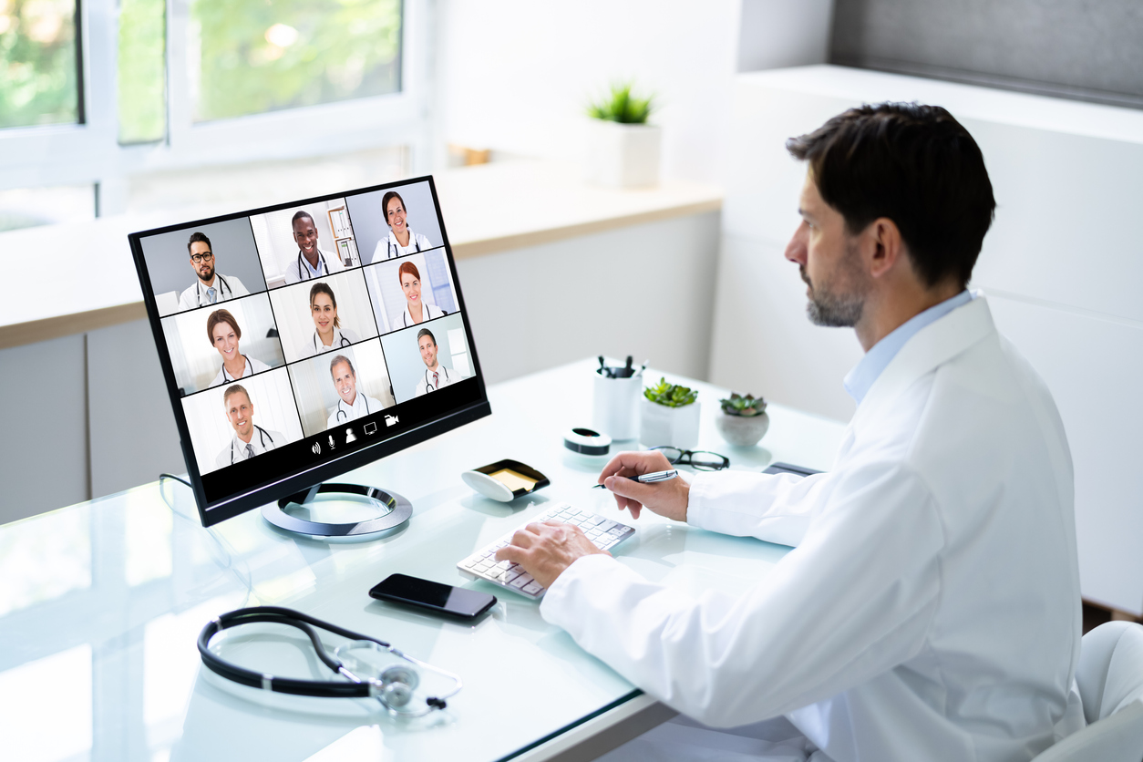 A health educator leads a remote training course via videoconference.
